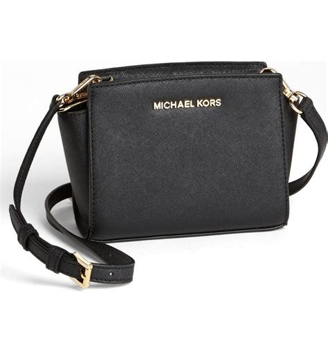 what fits in michael kors selma mini|michael kors large selma bag.